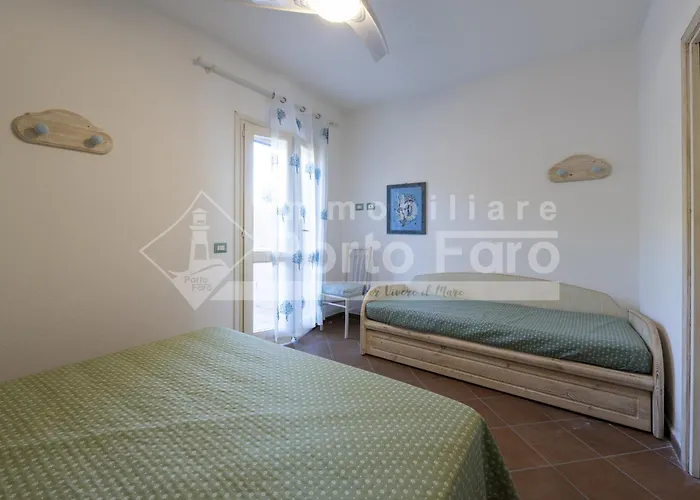 Appartement L301 - Bilocale Caposchiera Con Giardino E Vista Sulla Di Porto Mannu *